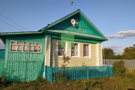 Уютный дом с большим участком.